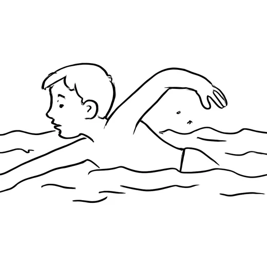 A boy swimming front crawl in a swimming pool