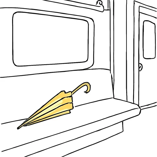 A yellow umbrella lying on a seat inside an MRT train carriage
