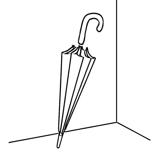 A yellow umbrella propped against a wall inside a classroom